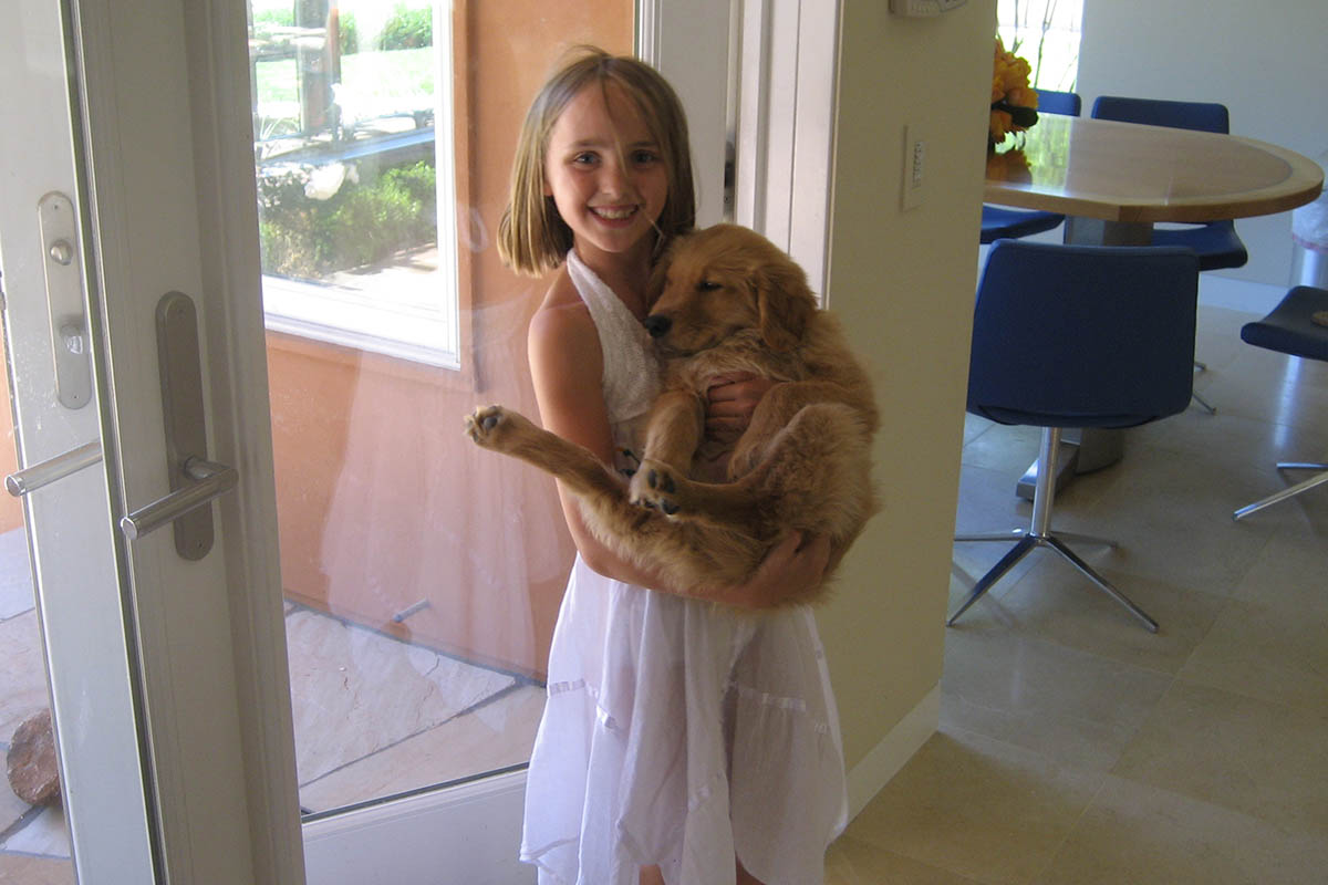 Daddy holding puppy Beta