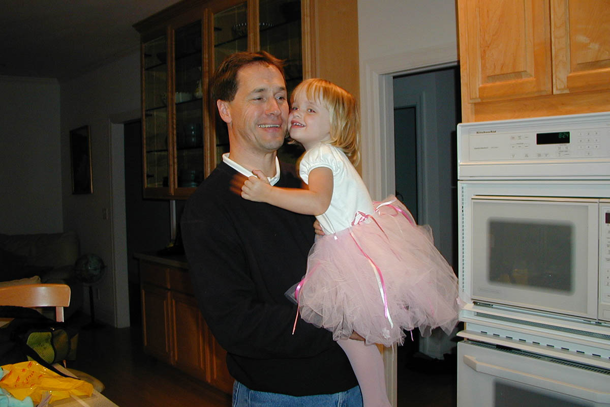 Daddy holding Amber after work