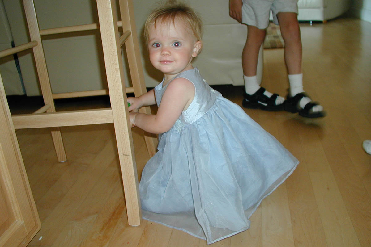 Princess Amber...holding onto chair to stand