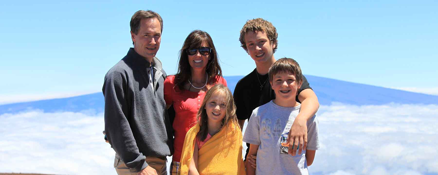 Family photo atop Mauna Kea