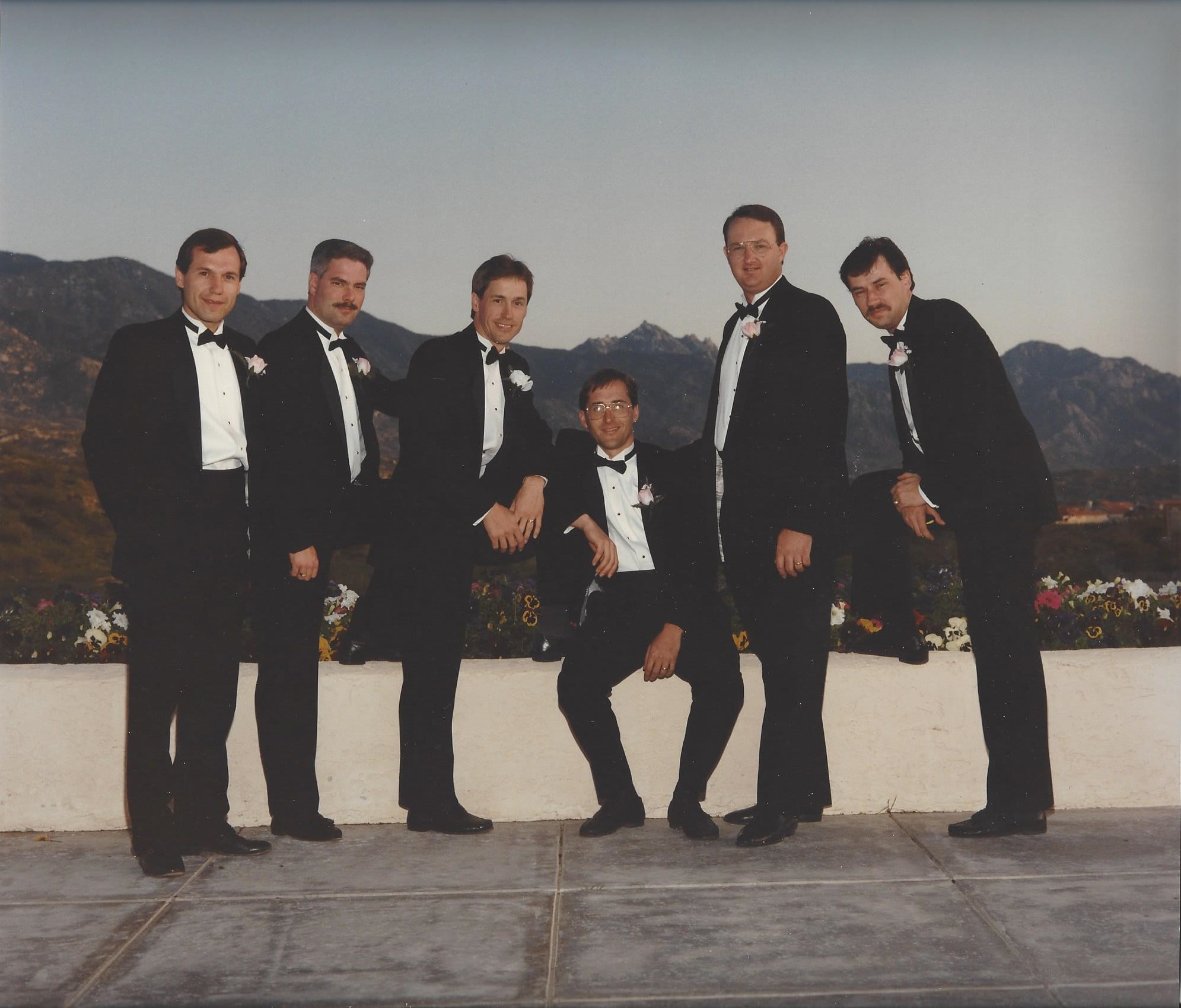 Groomsmen on seat wall