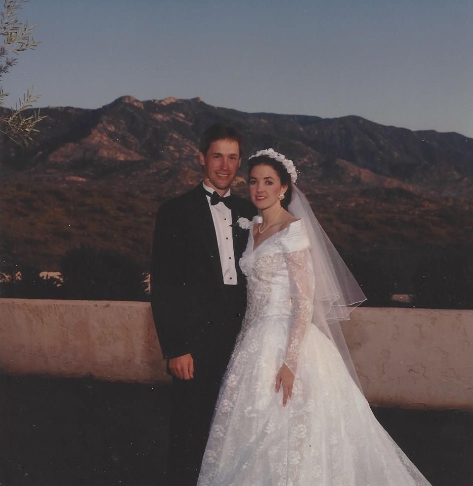 Bride and groom in front of mountains