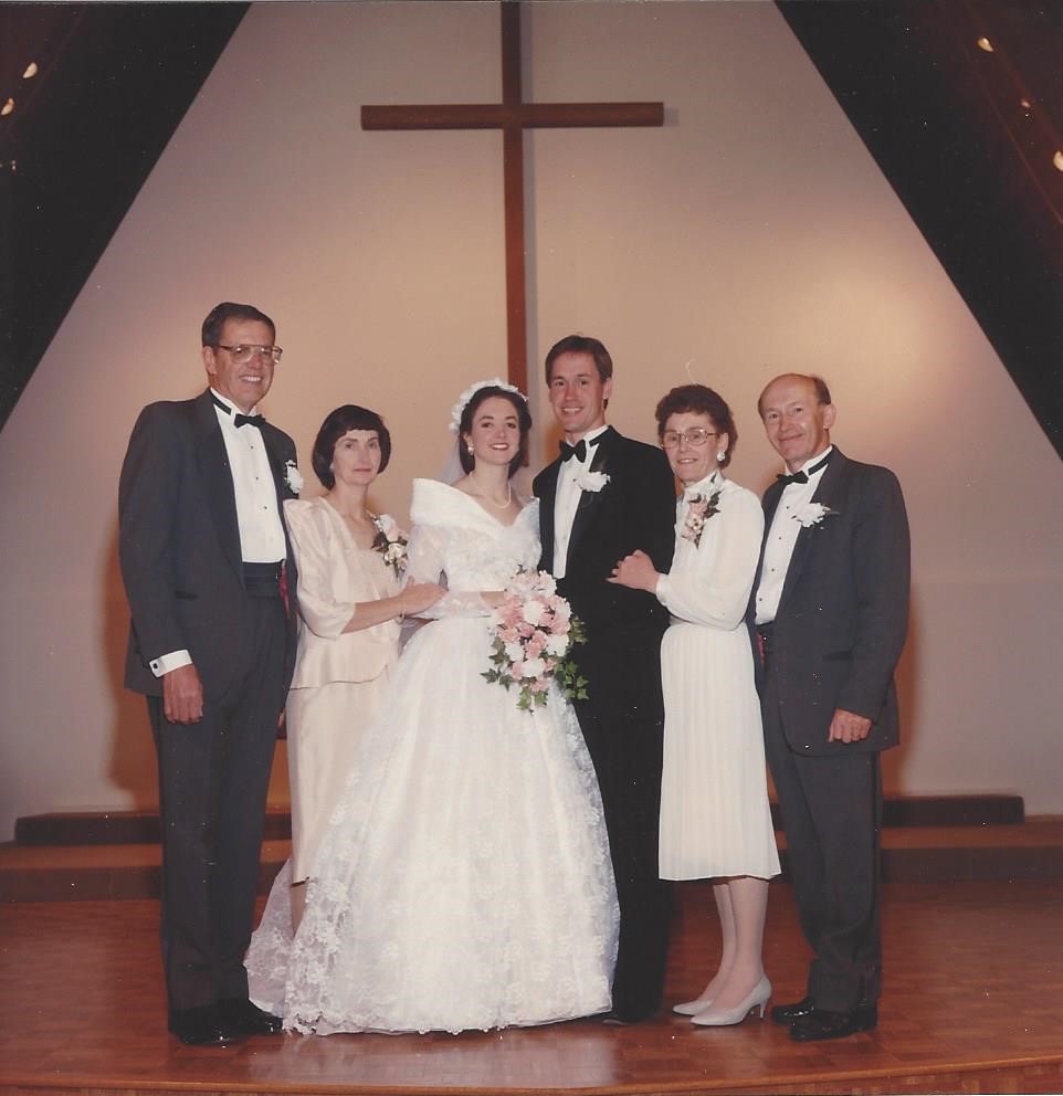 Bride and groom with parents